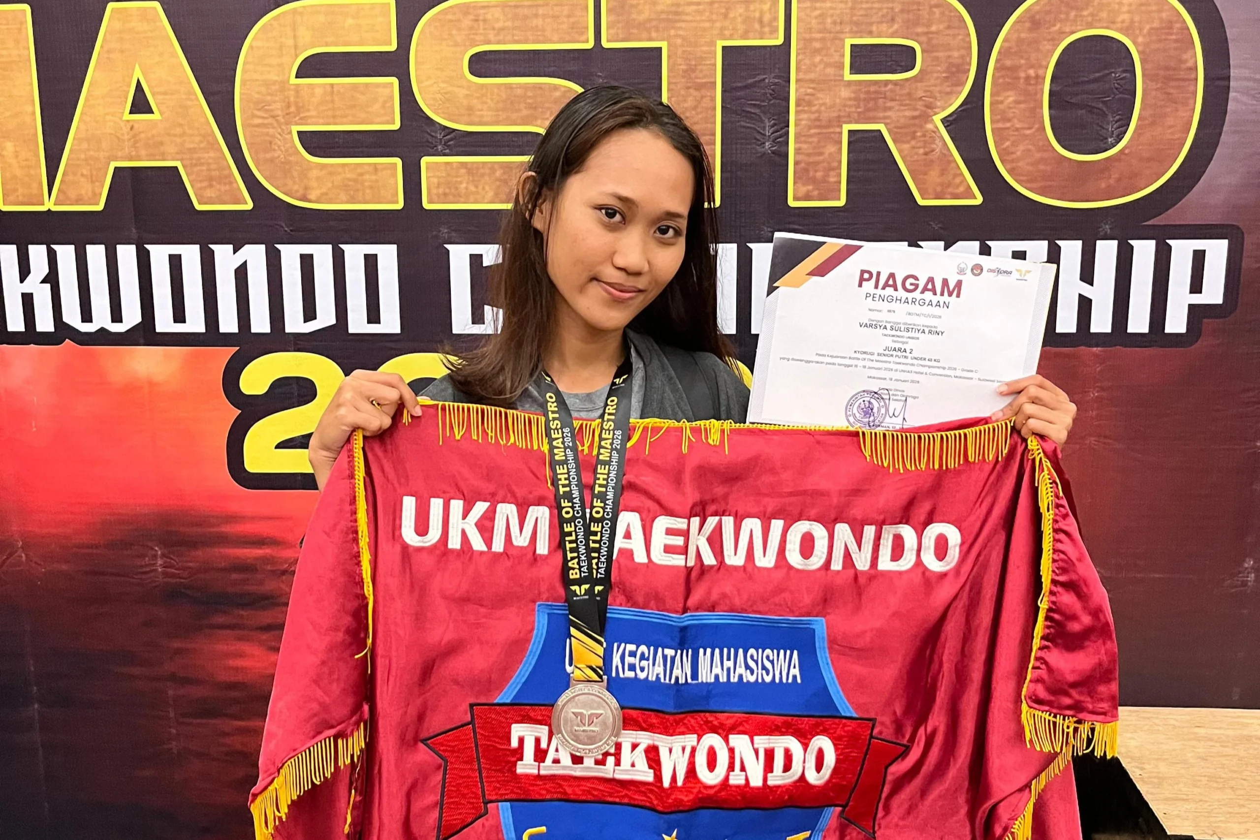 MAHASISWI TEKNOLOGI INFORMASI UNIBOS TUNJUKKAN PRESTASI PADA KEJUARAAN TAEKWONDO KATEGORI KYORUGI